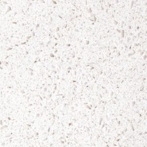 Close-up texture of a white terrazzo surface with small grey and off-white stone chips scattered throughout, creating a speckled pattern.