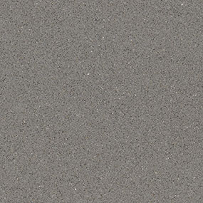 Close-up of a textured gray concrete surface with a speckled appearance and small white and dark spots scattered throughout.