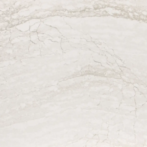 A close-up view of a marble surface with delicate, wavy gray veining on a light, creamy background. The texture shows natural variations and subtle cracks, giving a polished and elegant appearance.