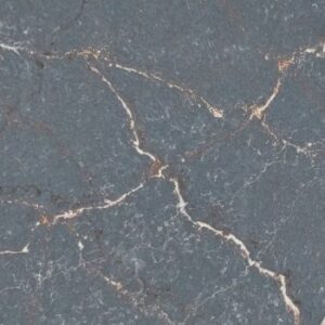 Close-up of a dark grey marble surface with irregular white and light grey veining throughout, creating a natural, intricate pattern.