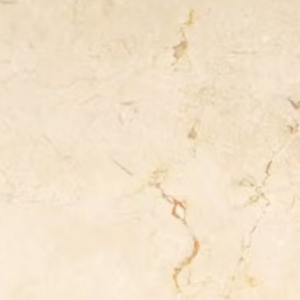 A smooth, light beige marble surface with subtle brown and cream veins forming a delicate pattern. The texture appears polished and the colors vary slightly, creating a natural and elegant appearance.