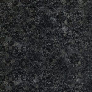 A dark granite surface with a speckled pattern of gray and black flecks, creating a textured appearance.