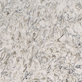 Close-up texture of a white and gray marble surface with intricate, wavy patterns and natural veining. The stone has an organic, flowing appearance with various shades of gray dispersed throughout the lighter background.