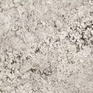 Close-up of a textured surface with a mix of light gray and white tones. The pattern resembles the natural veining and speckling found in granite or marble, creating an abstract and organic appearance.