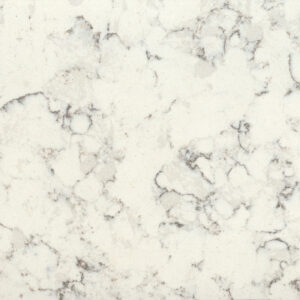 Patterned marble surface with a white and gray color scheme, featuring irregular dark veining throughout. The stone has a natural, textured appearance.