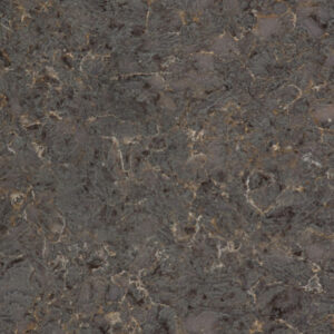 A close-up of a dark, textured surface resembling granite or marble. The pattern features a mix of deep greys, blacks, and subtle hints of brown, with lighter veining throughout. The surface has a natural, polished appearance.