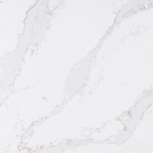 White marble surface with subtle gray veining, creating a natural and elegant pattern. The texture is smooth and the veining is irregular, adding a touch of sophistication to the overall appearance.