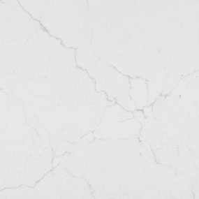 White marble surface with subtle gray veining patterns running through it, creating a natural and elegant appearance.