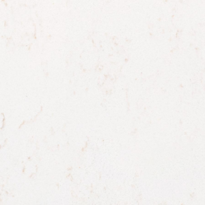 A close-up of a light-colored, off-white textured surface with faint beige and tan specks and subtle irregular patterns.